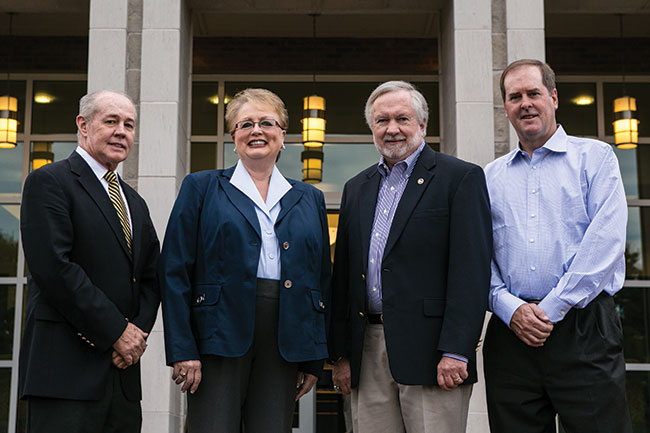 Settles on as New Member The Foundation Board of Trustees welcomes new Board Member, David Settles, Atlanta, Ga., to the Board. Pictured left to right are: Outgoing Chair Tommy Bond, Foundation President Salinda Arthur, University President Brooks A. Keel, Ph.D., and new Board Member David Settles.