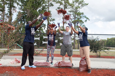 volunteers working on a dog park