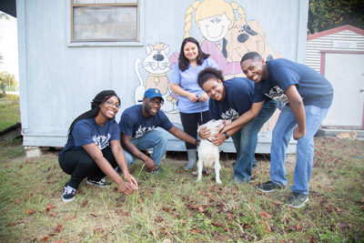 students donating at an animal shelter