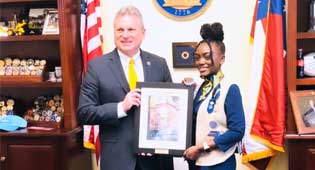 Congressman Buddy Carter and Liberty student Jaiden Thompson