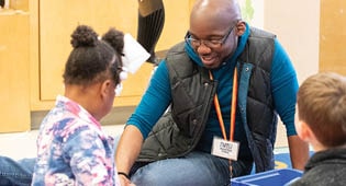 College of education student working with students
