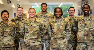 Front Row (l-r): Luis Benitez, Gavin Fehr, Ka'Leah Davis, and Jonathan Pritchett Back Row (l-r): Philip Folkerts, Treshawn Woods, and William Walker, Not pictured is James Miles