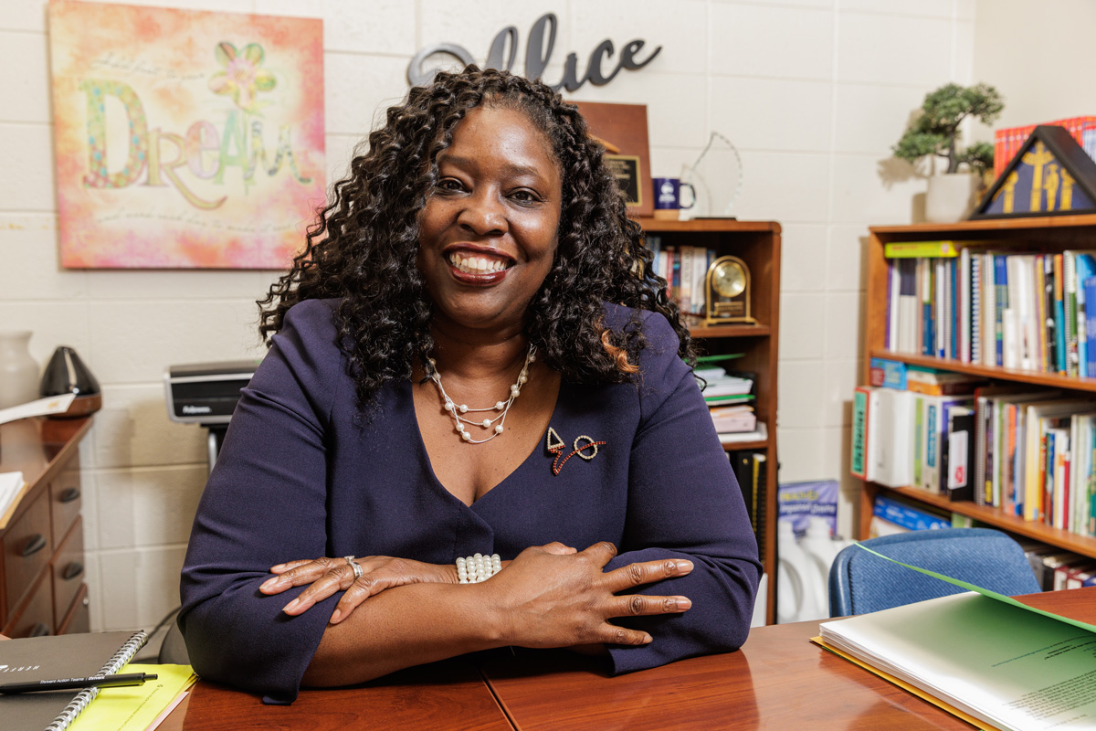 Jackie Pinkney-Brown sits in her office