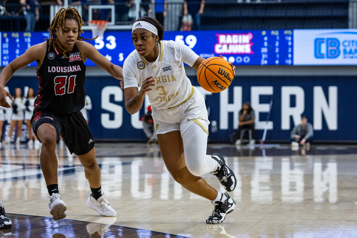 Terren Ward dribbles the ball against a defender