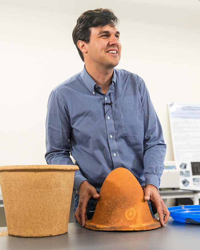 Lewis Stetson Rowles creating traditional Navajo pottery.