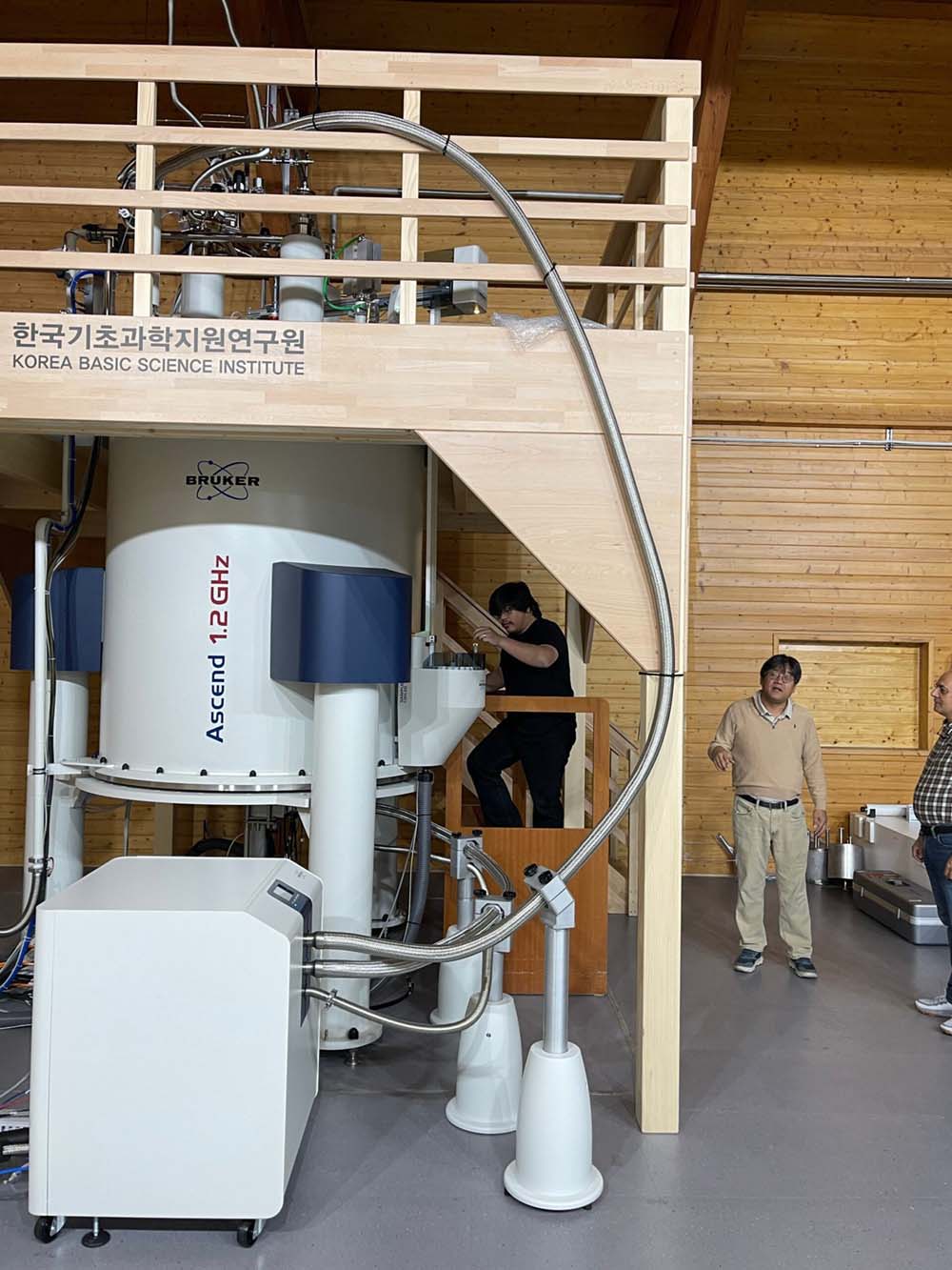 Mark dela Cerna, Ph.D., observes one of the world’s largest spectrometers.